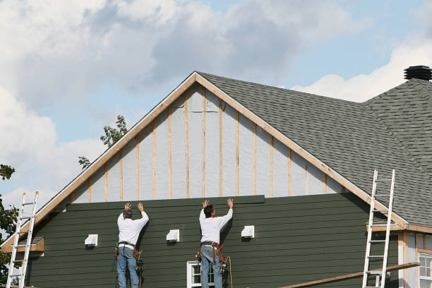 Professional Siding Replacement technician working in Bloomingdale, NJ